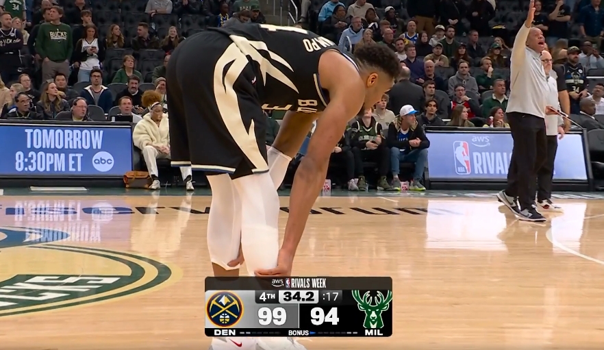 开云官网-沮丧！字母哥小腿不舒服啊 走去球员通道又回了替补席！